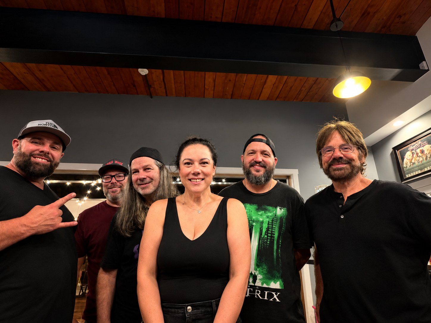Lights Out band members posing together indoors